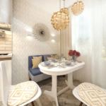 Дизайн интерьера кухни в белых тонах 10 кв.м, обеденный стол, синий диван, белый кухонный гарнитур, золотые светильники